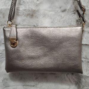 Metalic pewter crossbody with lock & lots of room.